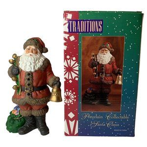 Traditions Christmas Porcelain Santa Claus Figurine Holding Bells Bag of Toys